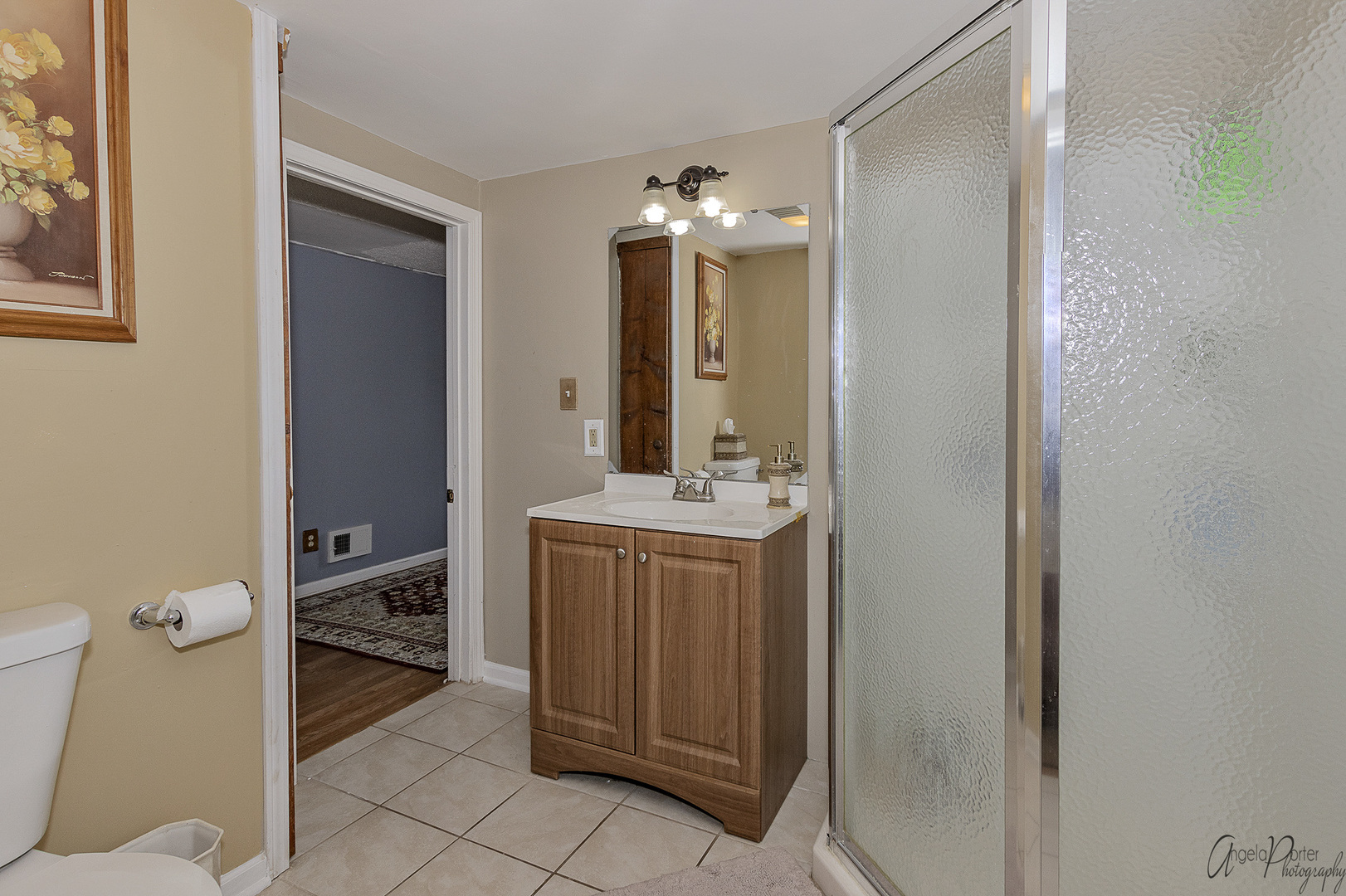 26316 West Rollins Road Ingleside, IL 60041 - Photo 24 of 45 a bathroom with a double vanity sink mirror and toilet