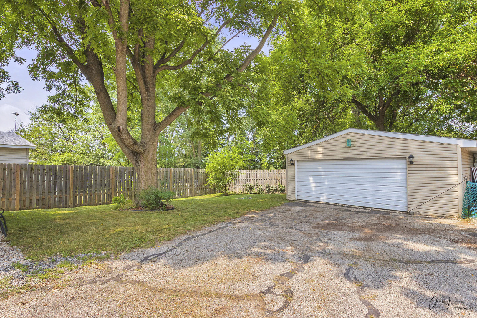 26316 West Rollins Road Ingleside, IL 60041 - Photo 33 of 45 a front view of a house with yard and tree