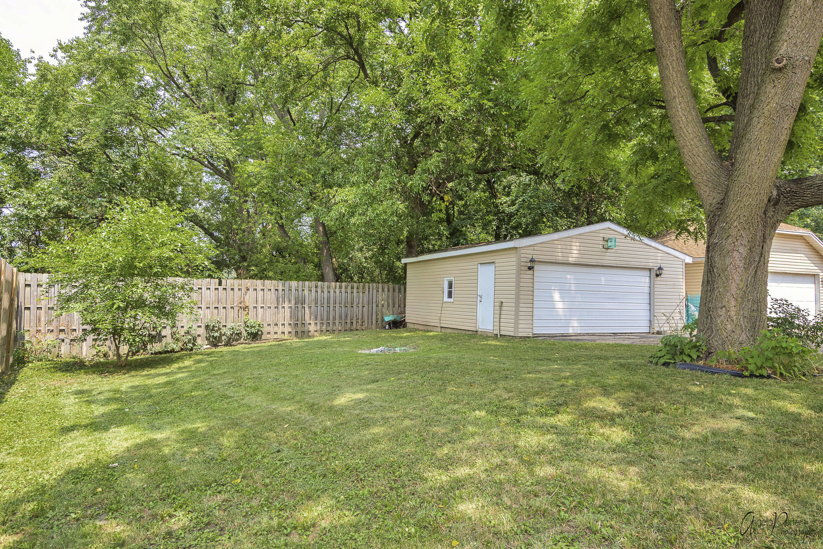 26316 West Rollins Road Ingleside, IL 60041 - Photo 36 of 45 a house view with a garden