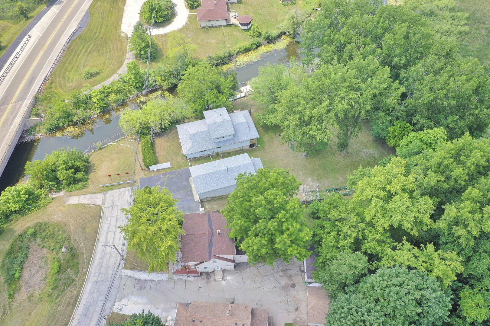 26316 West Rollins Road Ingleside, IL 60041 - Photo 42 of 45 an aerial view of residential house with outdoor space and trees all around