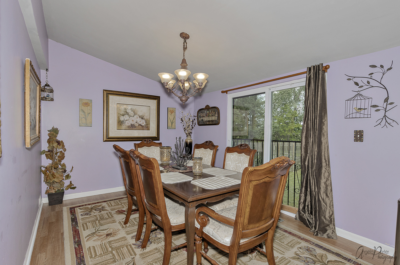 26316 West Rollins Road Ingleside, IL 60041 - Photo 6 of 45 a dining room with furniture a large window and a chandelier