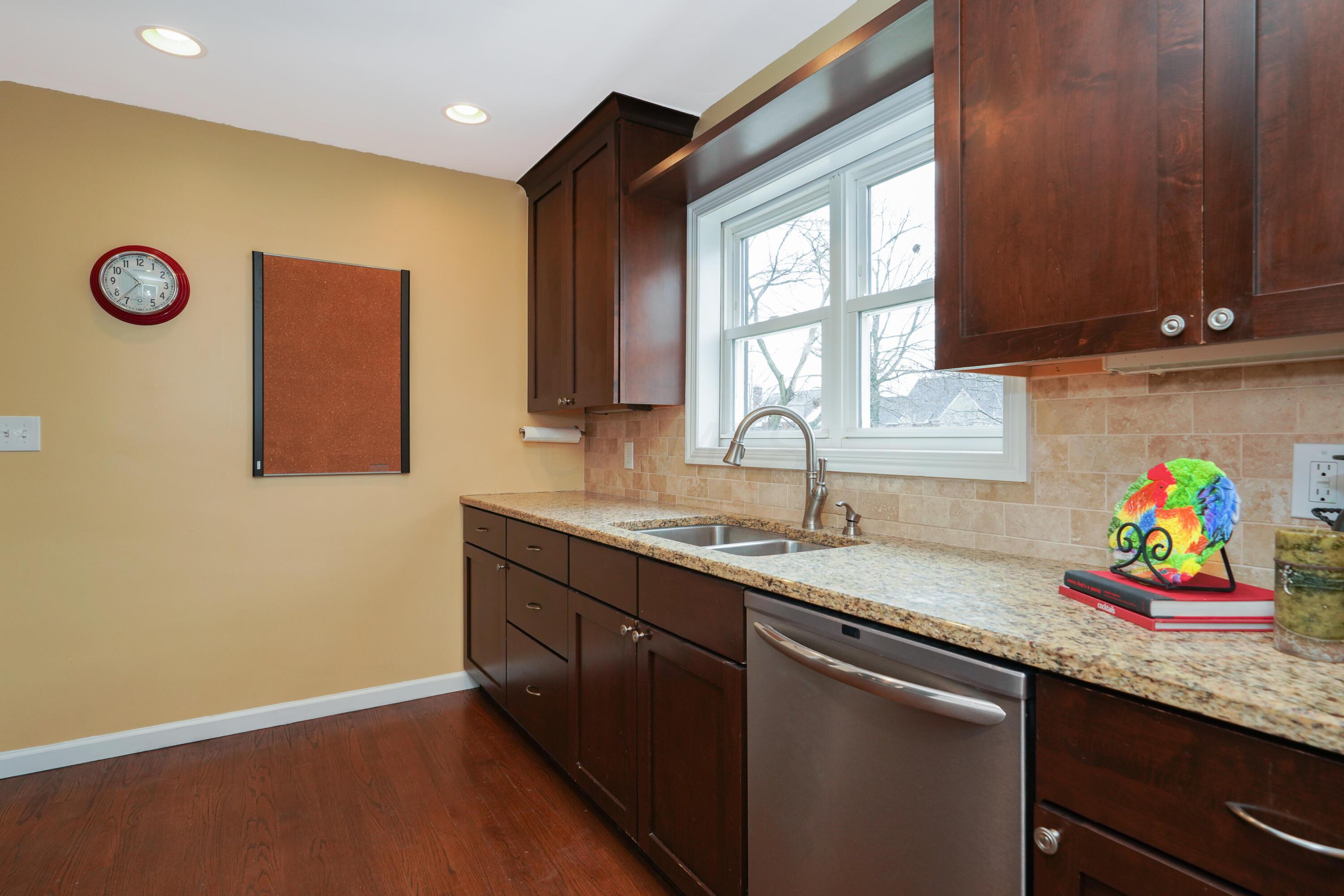 2104 Jervis Road Columbus, OH 43221 - Photo 7 of 31 Custom cabinets and granite counters'