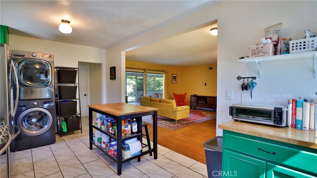5035 Greer Avenue Covina, CA 91724 - Photo 12 of 37 a living room with fireplace furniture and a flat screen tv