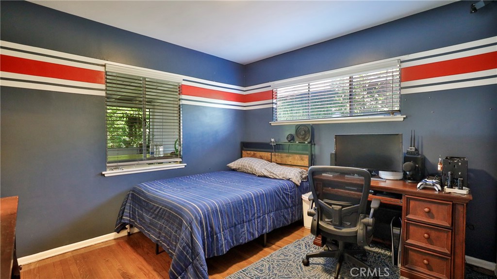 5035 Greer Avenue Covina, CA 91724 - Photo 23 of 37 a bedroom with a bed and a window