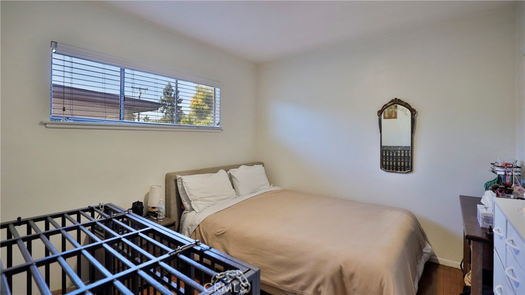 5035 Greer Avenue Covina, CA 91724 - Photo 27 of 37 a bedroom with a bed and a window