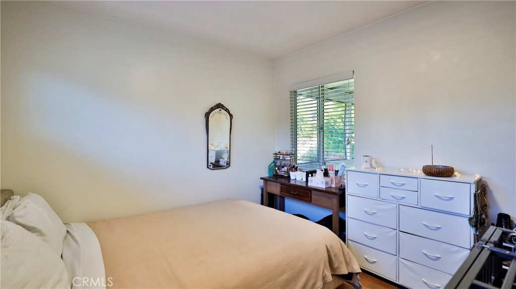 5035 Greer Avenue Covina, CA 91724 - Photo 28 of 37 a bedroom with a bed and a dresser