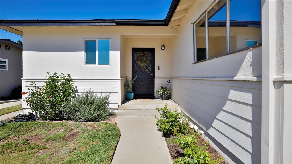 5035 Greer Avenue Covina, CA 91724 - Photo 3 of 37 a entryway with flower pots