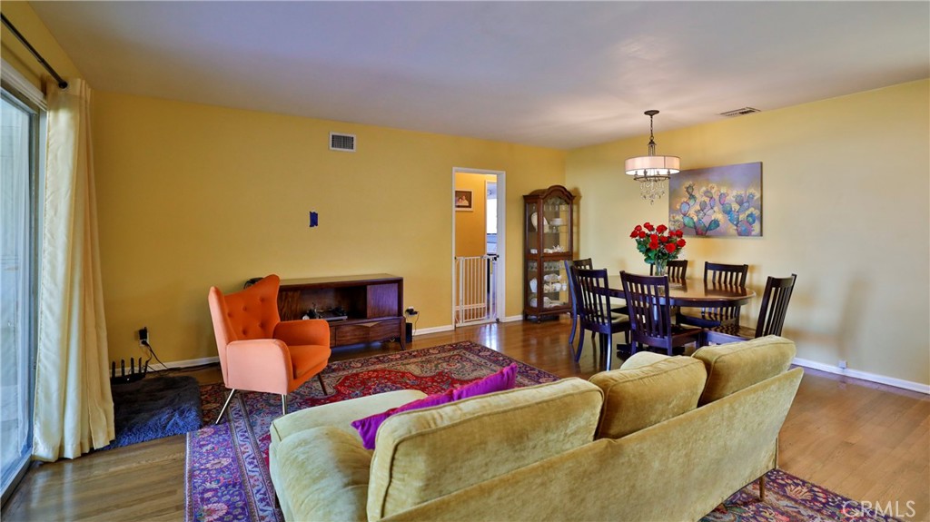 5035 Greer Avenue Covina, CA 91724 - Photo 4 of 37 a living room with furniture and a fireplace