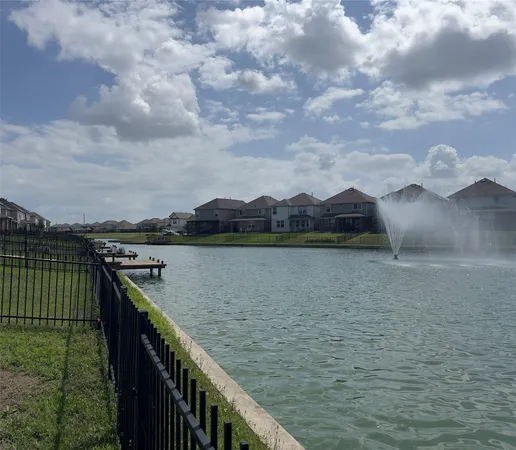 a view of a lake and a yard