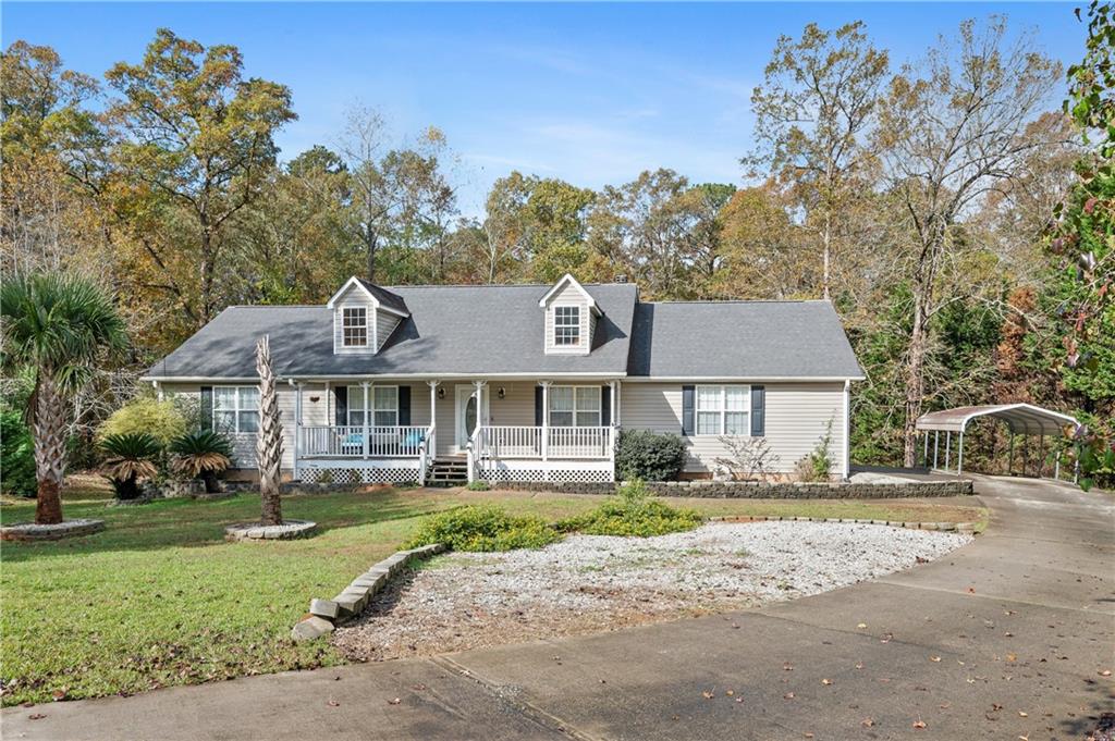 front view of a house with a yard