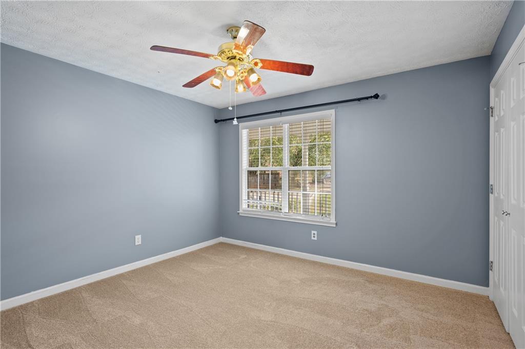 201 Nina Circle Locust Grove, GA 30248 - Photo 19 of 48 an empty room with a window