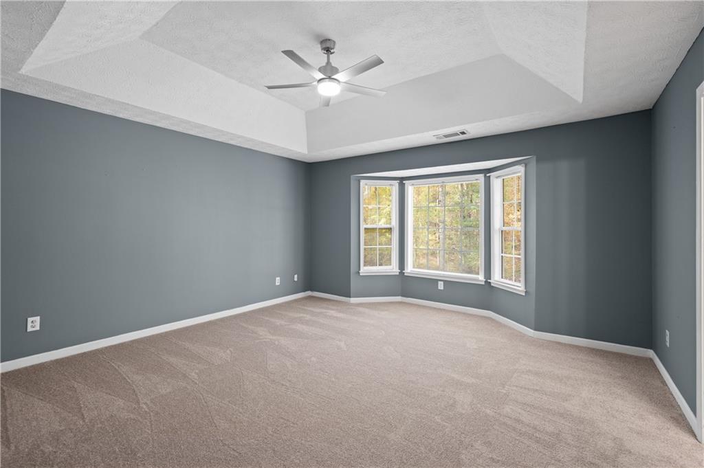 201 Nina Circle Locust Grove, GA 30248 - Photo 23 of 48 a view of an empty room with a window