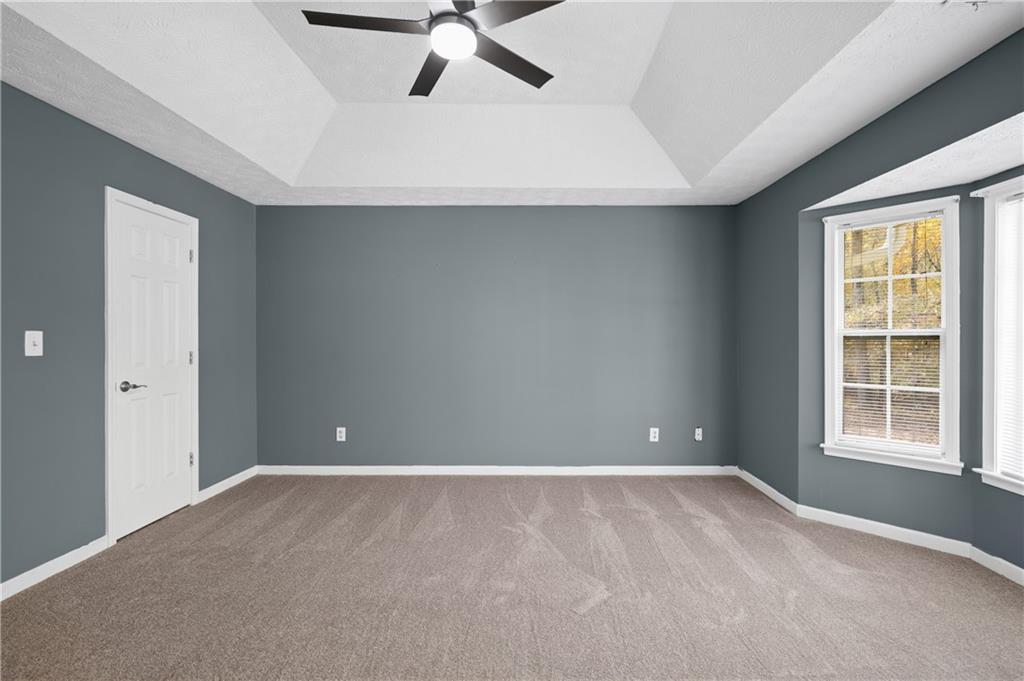 201 Nina Circle Locust Grove, GA 30248 - Photo 24 of 48 a view of an empty room with a window