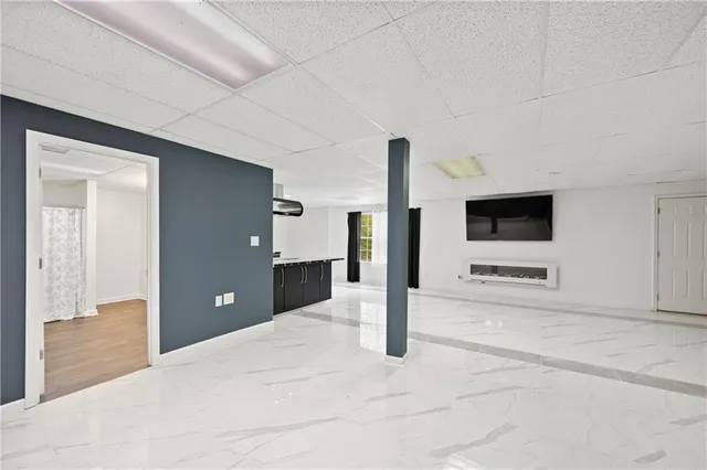 a view of a livingroom with a flat screen tv