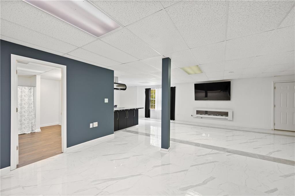 201 Nina Circle Locust Grove, GA 30248 - Photo 29 of 48 a view of a livingroom with a flat screen tv