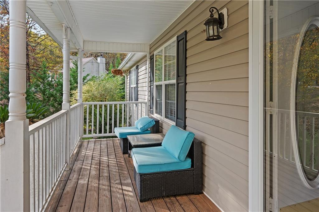 201 Nina Circle Locust Grove, GA 30248 - Photo 4 of 48 a view of a two chairs in the balcony