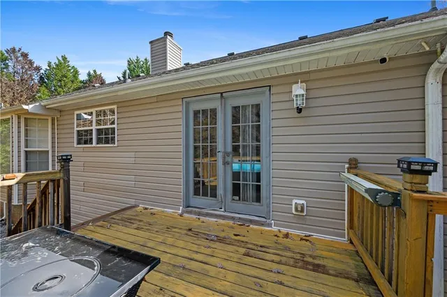 a blue bench sitting in front of a building