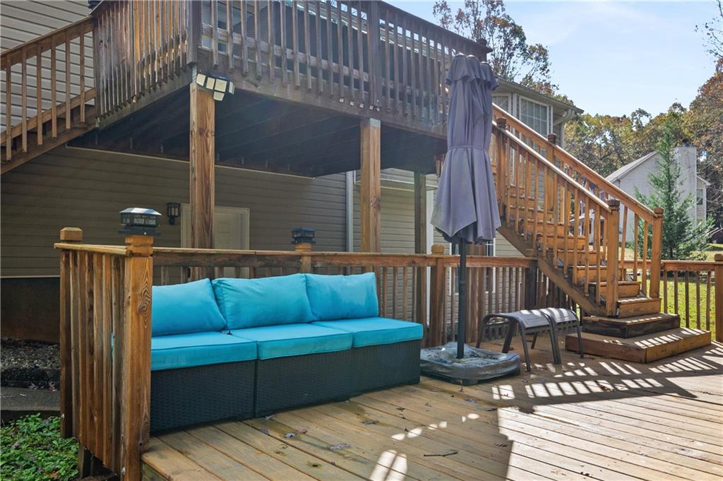 201 Nina Circle Locust Grove, GA 30248 - Photo 45 of 48 a blue bench sitting in front of a building