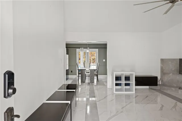 a view of kitchen with furniture and window