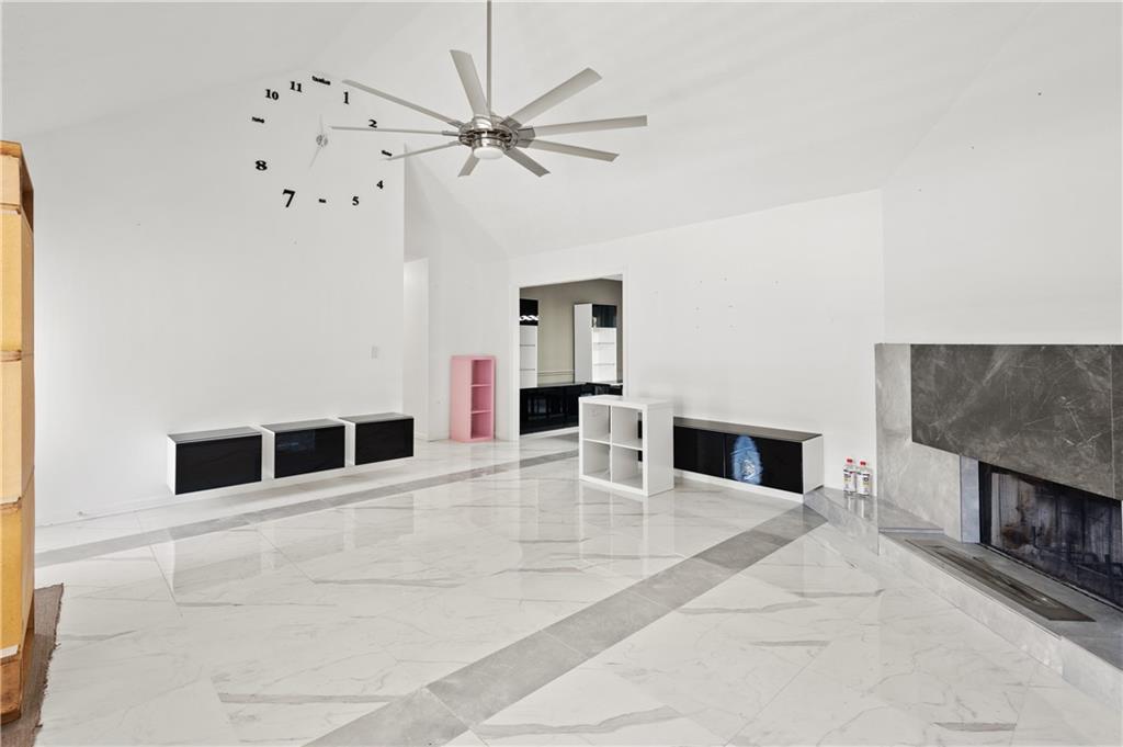 201 Nina Circle Locust Grove, GA 30248 - Photo 9 of 48 a living room with furniture and a fireplace