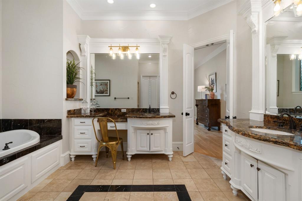 2101 Vail Road Southlake, TX 76092 - Photo 22 of 40 a bathroom with a granite countertop sink and a mirror
