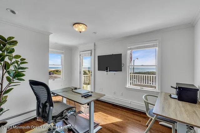 a workspace with furniture and a window