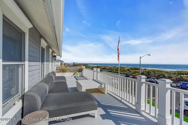 a view of balcony with furniture