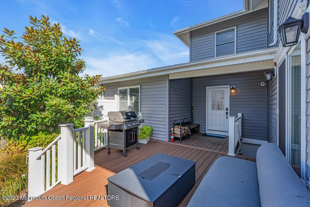 1609 Ocean Avenue Spring Lake, NJ 07762 - Photo 4 of 30 a view of a chairs and table in the patio
