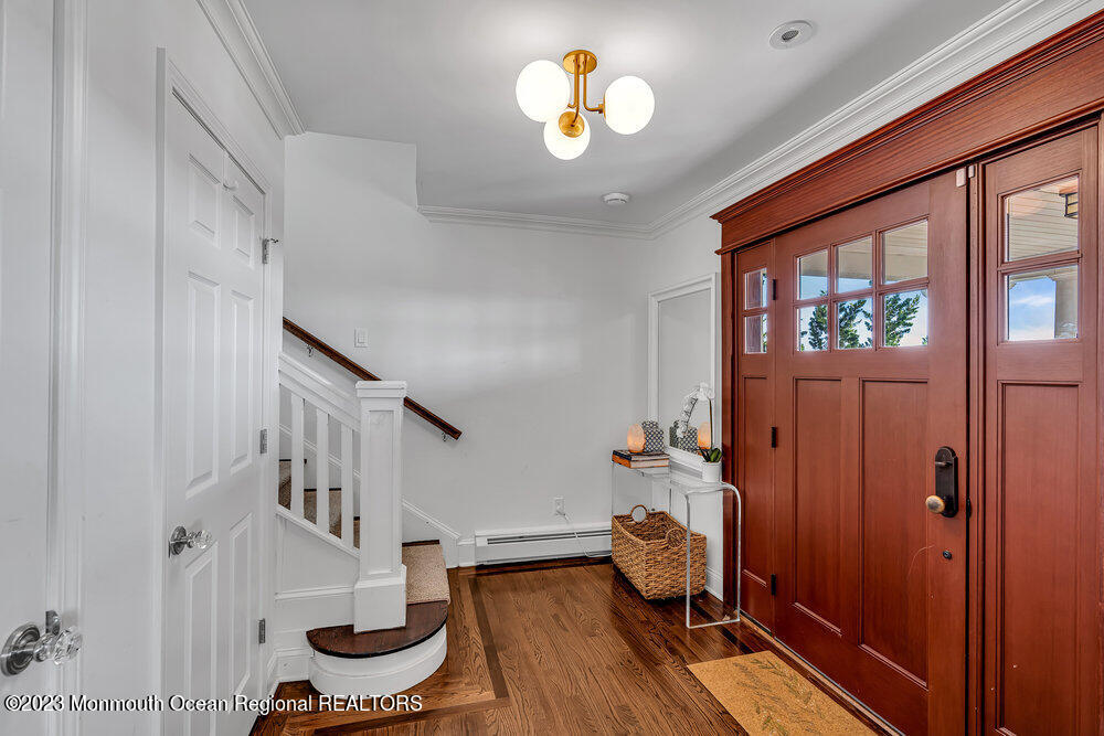 1609 Ocean Avenue Spring Lake, NJ 07762 - Photo 7 of 30 a view of a livingroom with furniture and hardwood floor