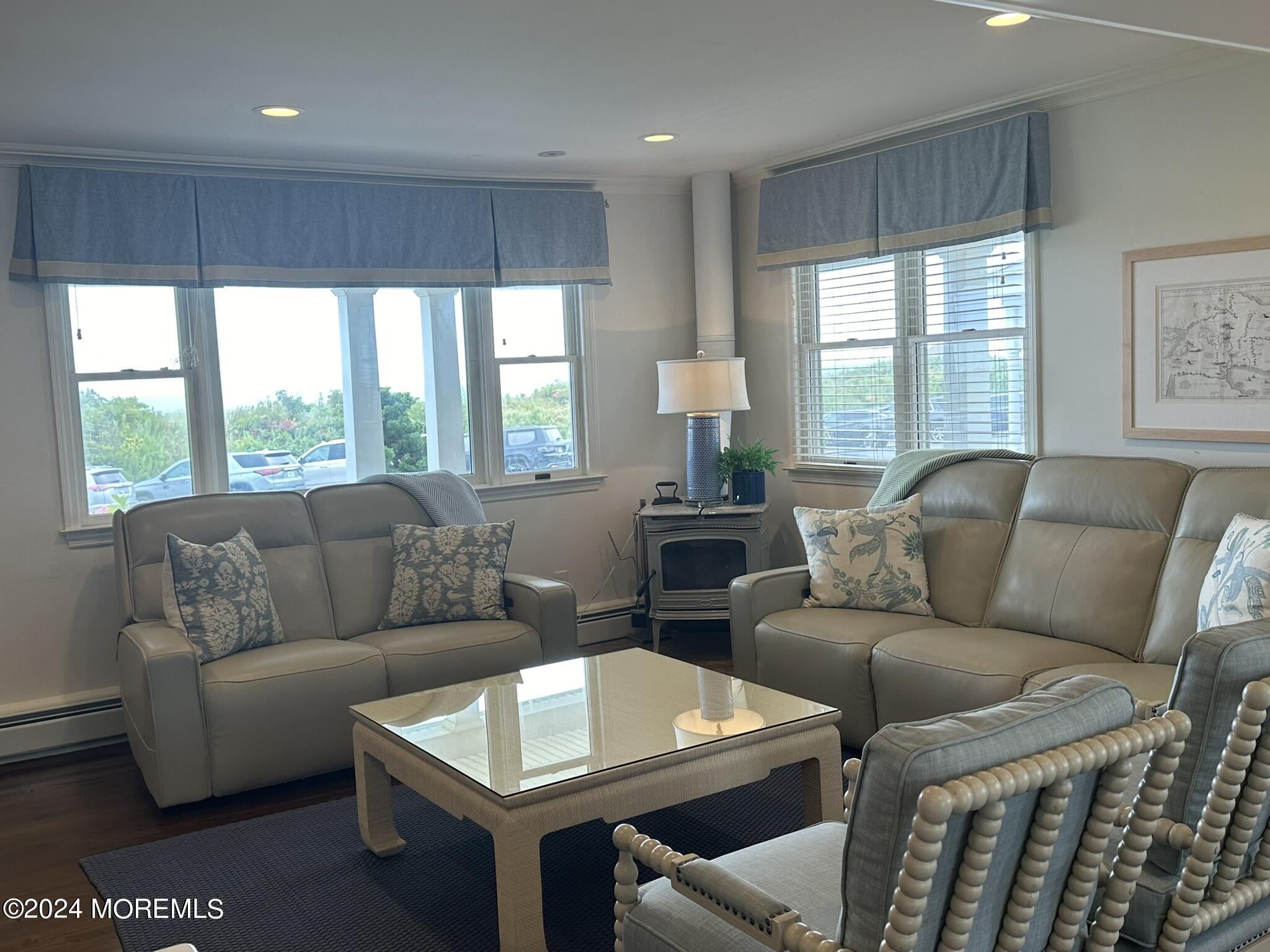 1609 Ocean Avenue Spring Lake, NJ 07762 - Photo 9 of 30 a living room with furniture and a large window