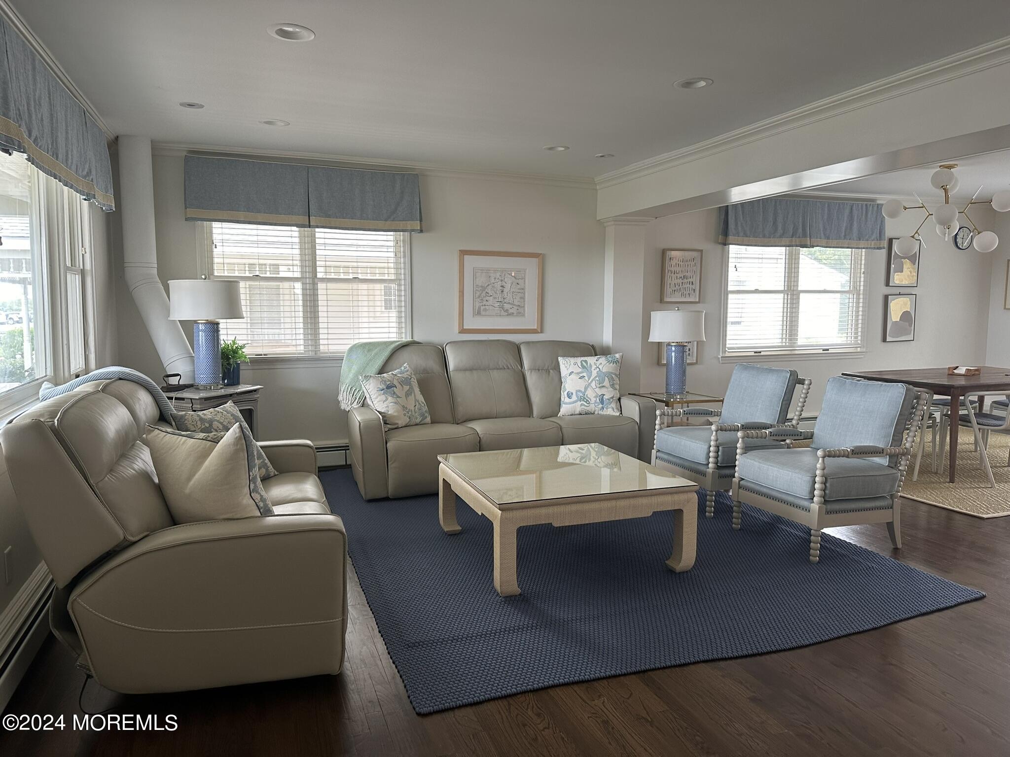 1609 Ocean Avenue Spring Lake, NJ 07762 - Photo 10 of 30 a living room with furniture wooden floor and a large window
