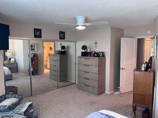 a view of a livingroom with furniture