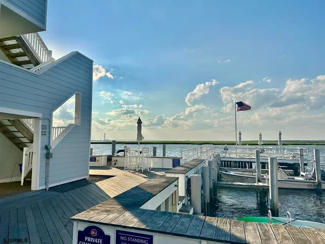 a view of a lake with a nearby beach