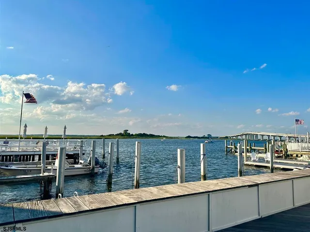 a view of roof deck with seating space and barbeque oven