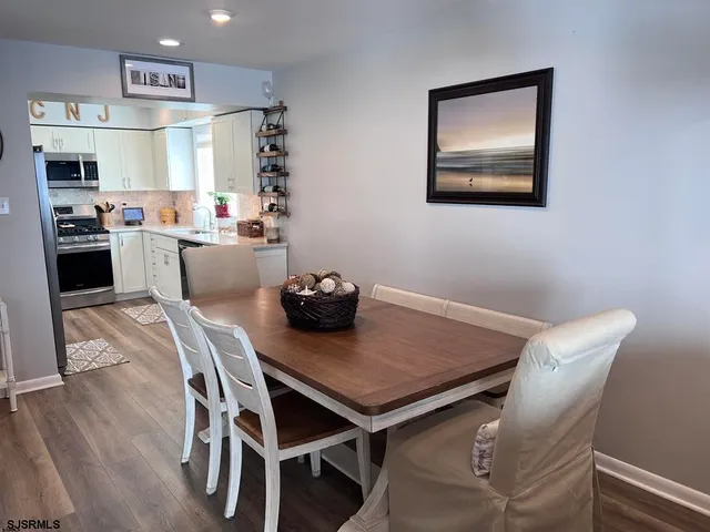 a view of a dining room with furniture