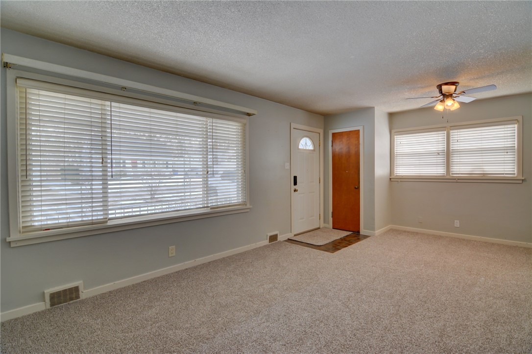 47 1st South Shores Avenue Decatur, IL 62521 - Photo 13 of 24 a view of an empty room with a window