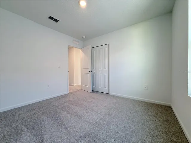 an empty room with an entryway