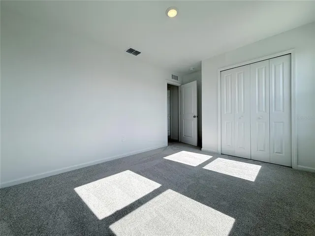 an empty room with an entryway