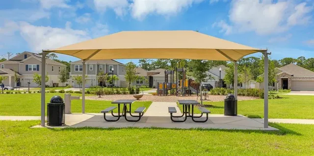 a view of a swimming pool with a lounge chairs