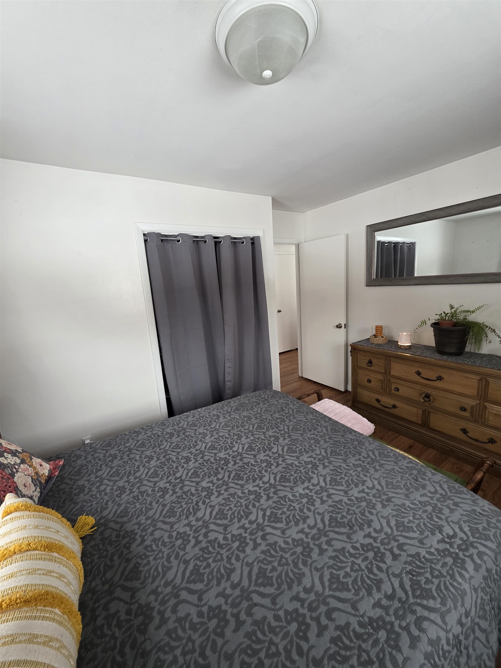 8617 Vicki Road Rockford, IL 61108 - Photo 13 of 22 a bedroom with a bed and cabinets