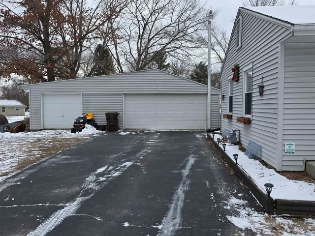 a view of a street with a tree