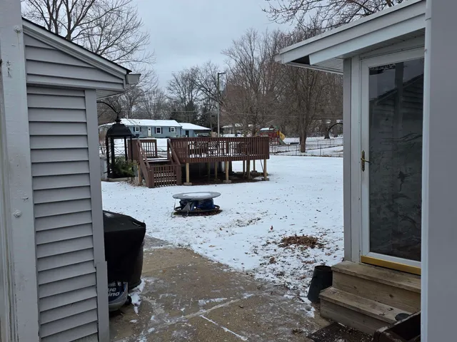 a view of living room filled with furniture and trees