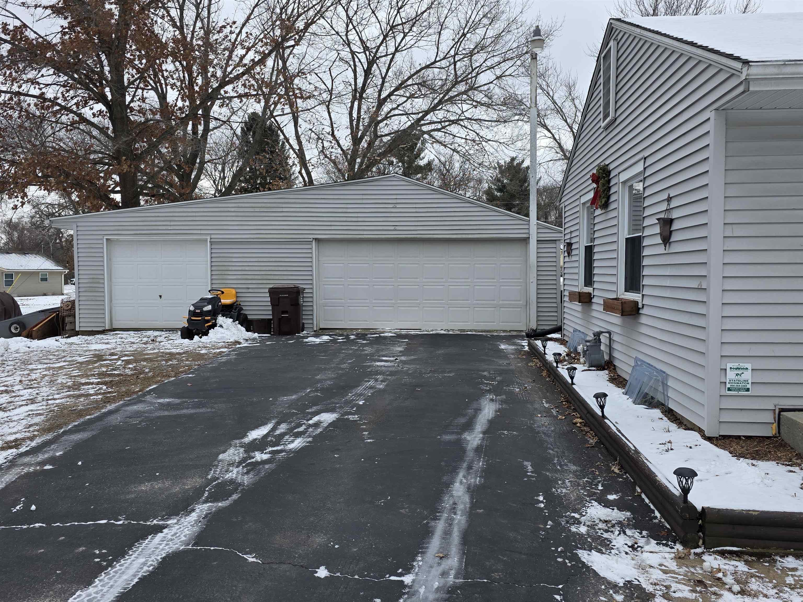 8617 Vicki Road Rockford, IL 61108 - Photo 5 of 22 a view of a street with a tree