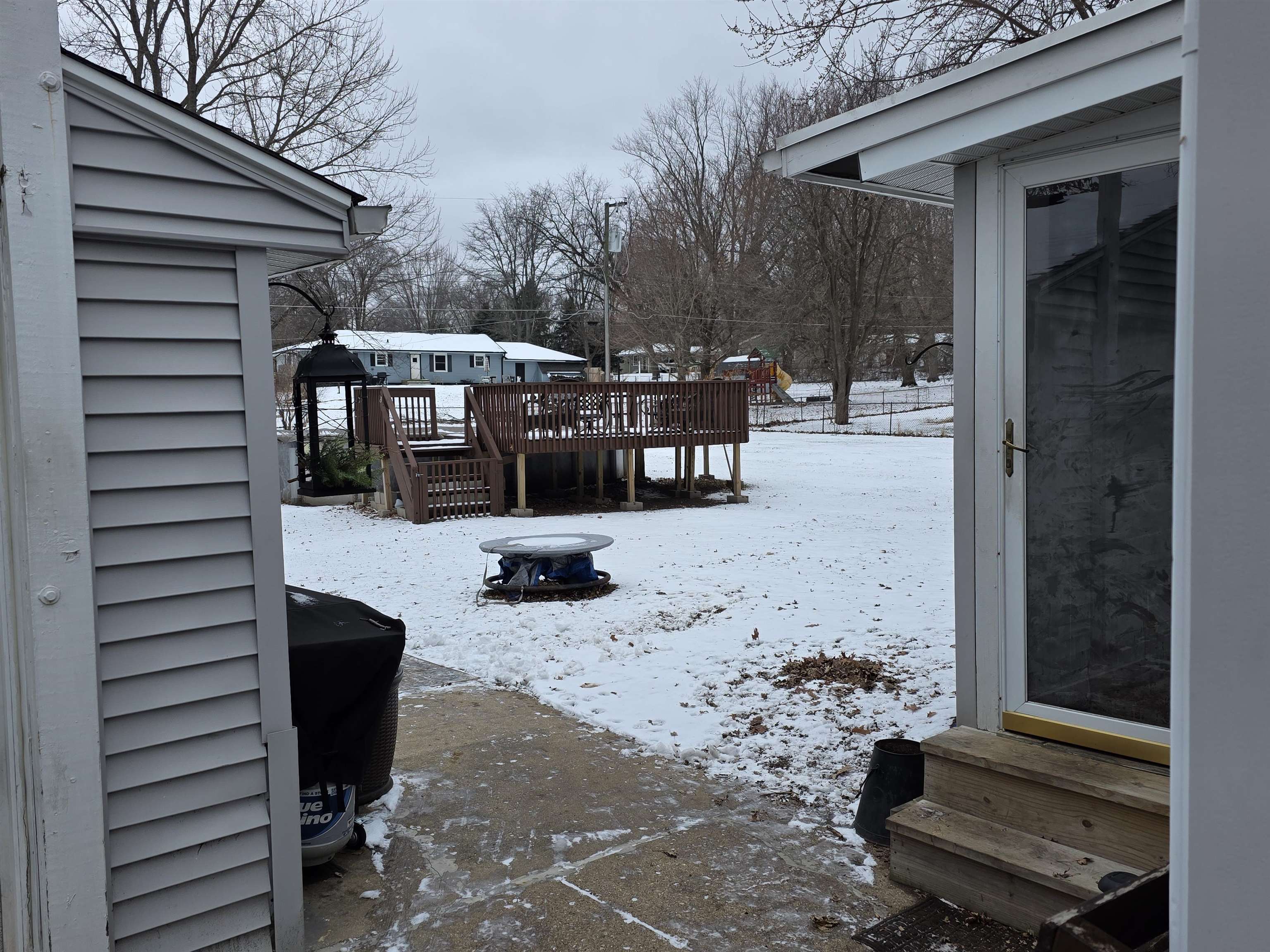 8617 Vicki Road Rockford, IL 61108 - Photo 6 of 22 a view of living room filled with furniture and trees