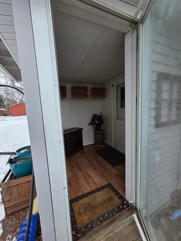 a kitchen with stainless steel appliances granite countertop a refrigerator stove microwave and sink