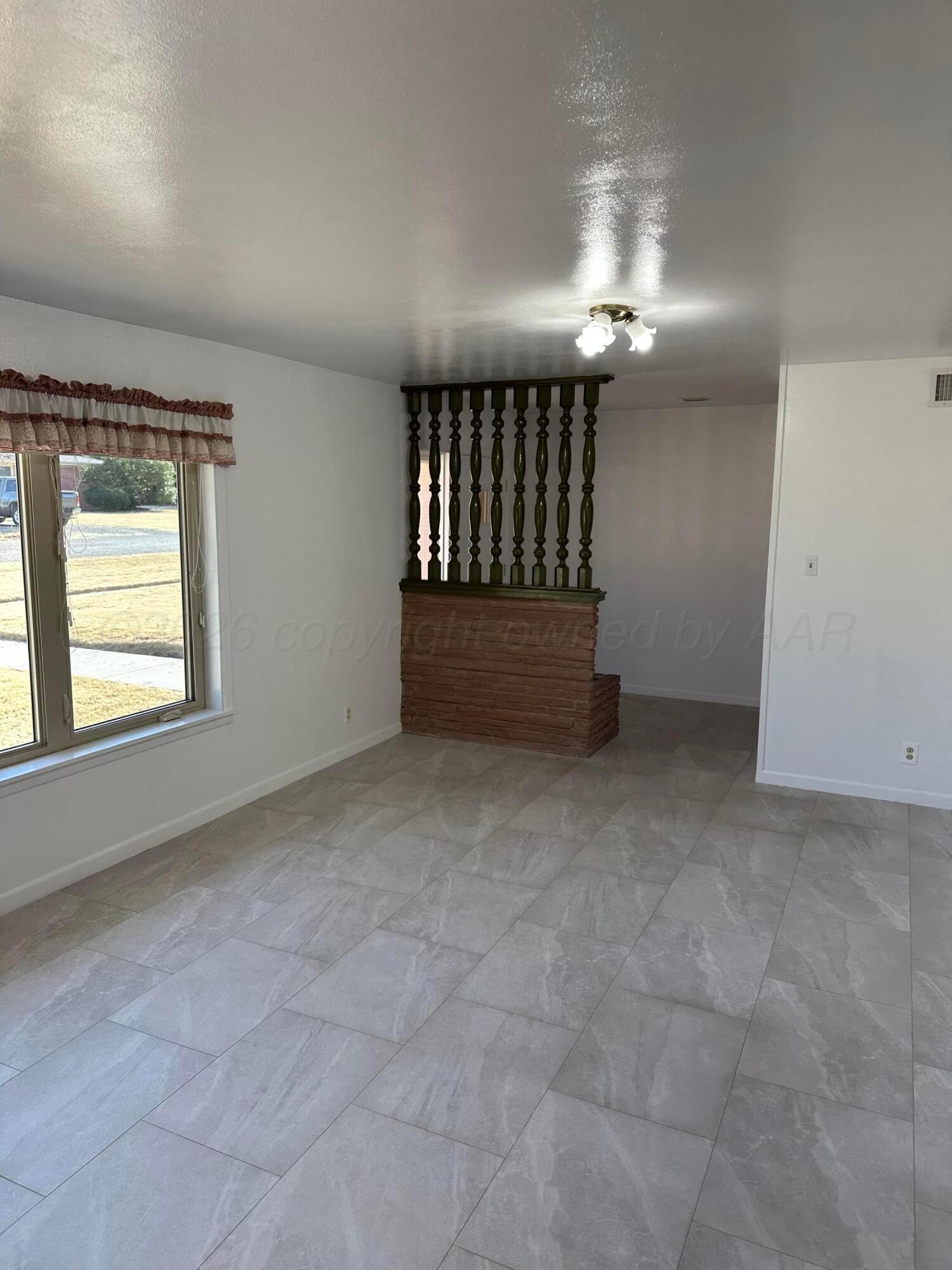 303 Tansy Street Borger, TX 79007 - Photo 4 of 27 IMG_3401