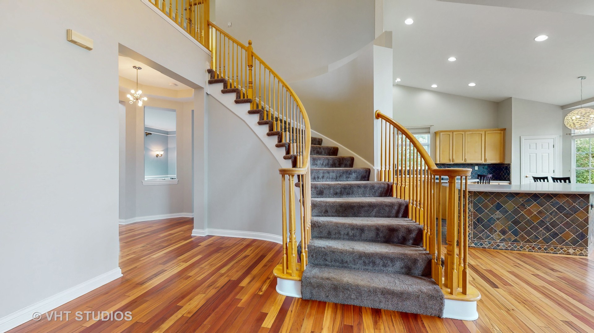 305 Saddle Lane Fox River Grove, IL 60021 - Photo 11 of 55 a view of entryway and hall with wooden floor