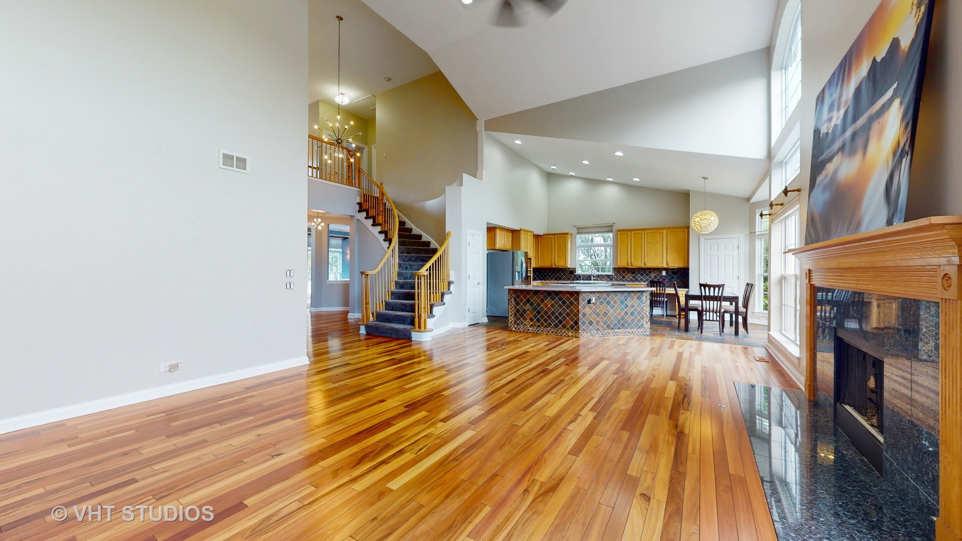 305 Saddle Lane Fox River Grove, IL 60021 - Photo 13 of 55 a view of a living room with wooden floor and a fireplace
