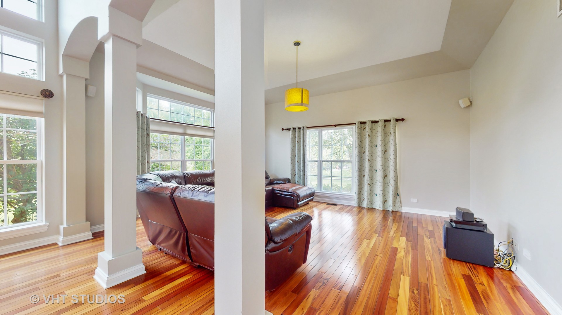 305 Saddle Lane Fox River Grove, IL 60021 - Photo 17 of 55 a view of a room with wooden floor and furniture