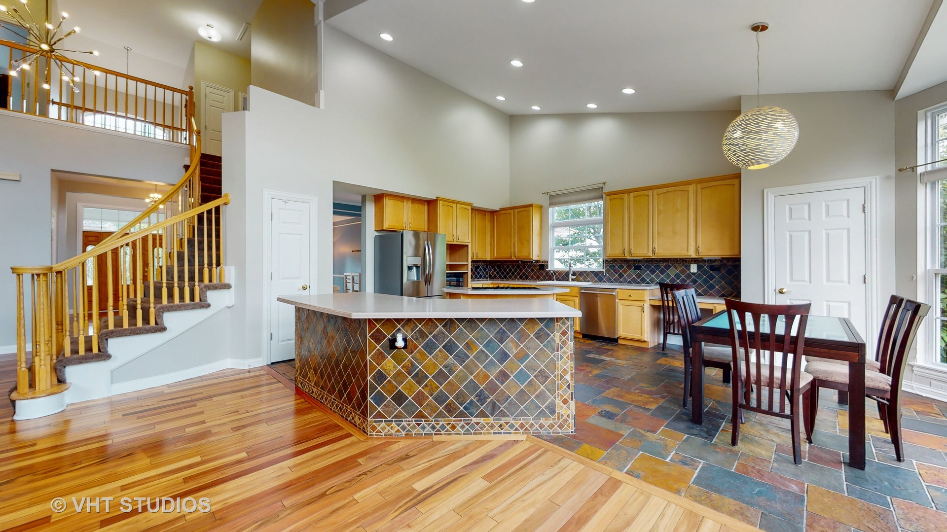 305 Saddle Lane Fox River Grove, IL 60021 - Photo 20 of 55 a large kitchen with lots of furniture and appliances